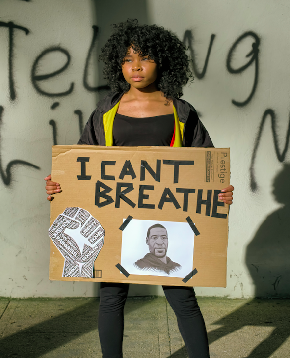 juneteenth clockingyou woman holding i can't breathe sign obi-onyeador unsplash