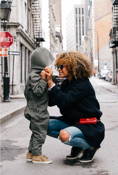 juneteenth clockingyou mother with child stop sign sai-de-silva-unsplash