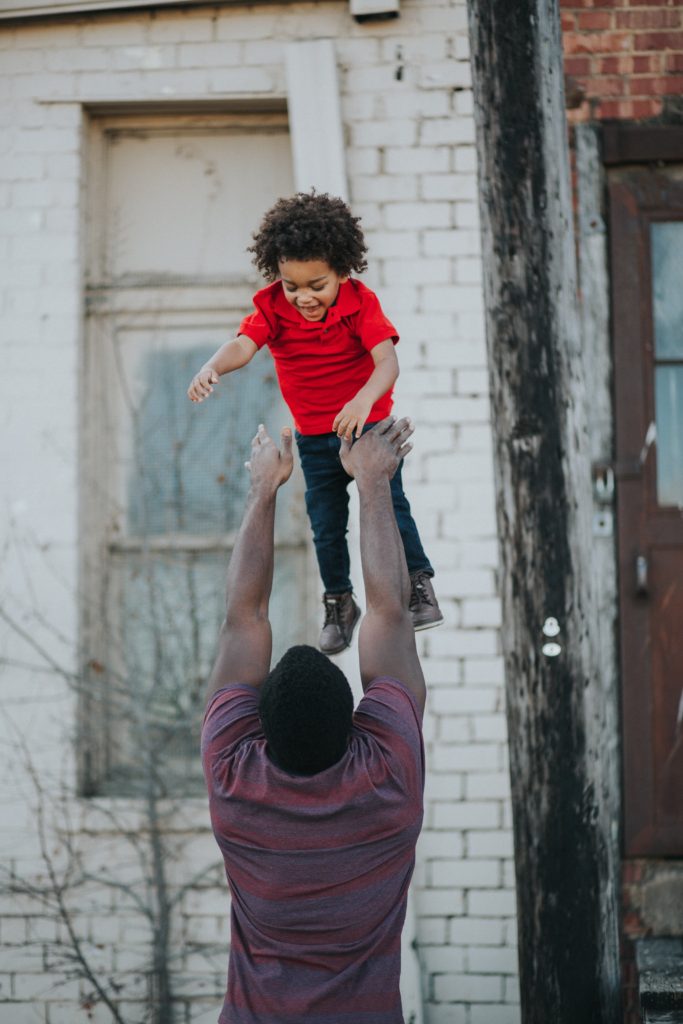 juneteenth clockingyou father playing with child conner-baker unsplash