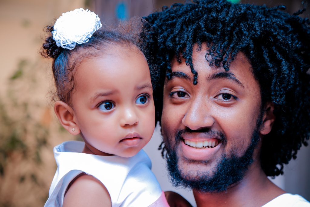 juneteenth clockingyou father with baby girl gift-habeshaw unsplash
