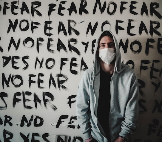 man-wearing-face-mask-no-fear-Korhan on Pexels