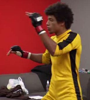 Alex Caceres Bruce LeeRoy iconic yellow and black track suit