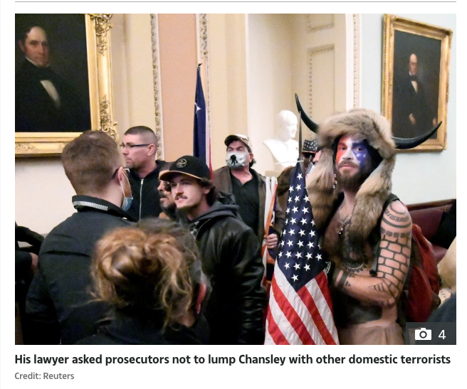 Jake Angeli at the Capital 06 Jan 2021 photo credit Reuters via The Sun