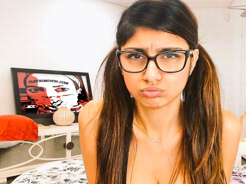 girl wearing glasses clockingyou logo on laptop